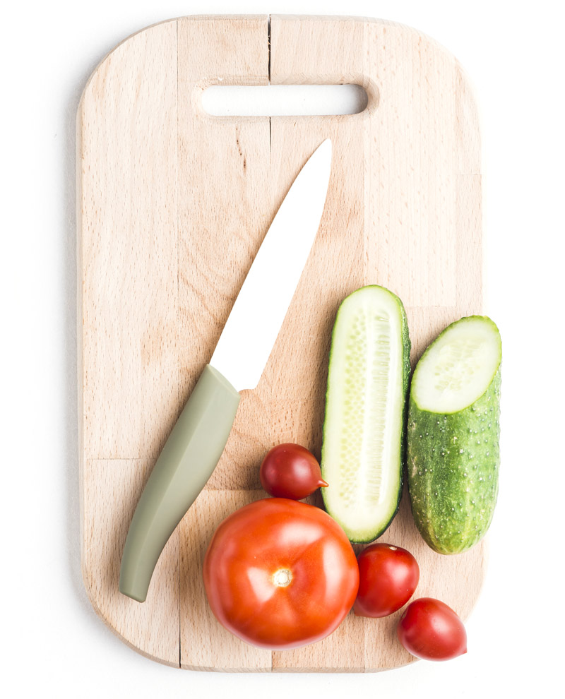 Cucumbers & Tomatos on Cutting Board